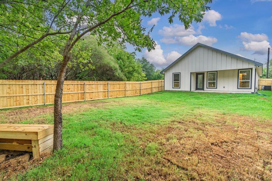 Front exterior of a new home in , Greenville, TX, highlighting curb appeal (Image 1). Front exterior of a new home in , Greenville, TX, highlighting curb appeal (Image 1).