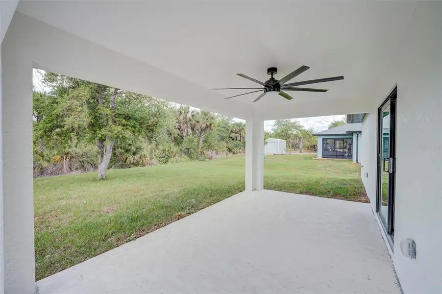 Exterior details and patio area of a home in , Port Charlotte (Image 2). Exterior details and patio area of a home in , Port Charlotte (Image 2).