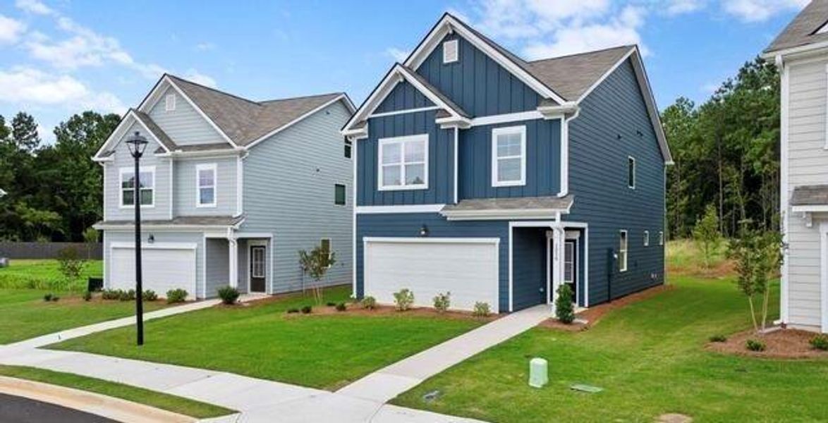 Front exterior of a new home in Walden Park - The Retreat, Jonesboro, GA, highlighting curb appeal (Image 2). Front exterior of a new home in Walden Park - The Retreat, Jonesboro, GA, highlighting curb appeal (Image 2).
