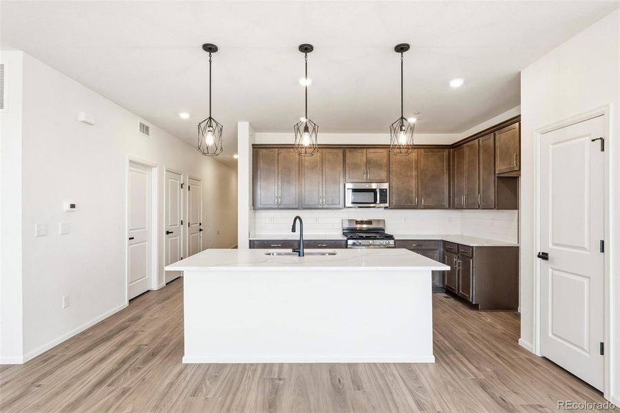 Furnished interior view inside a new home in The Nest Classic at Canyon Creek, Erie (Image 15).