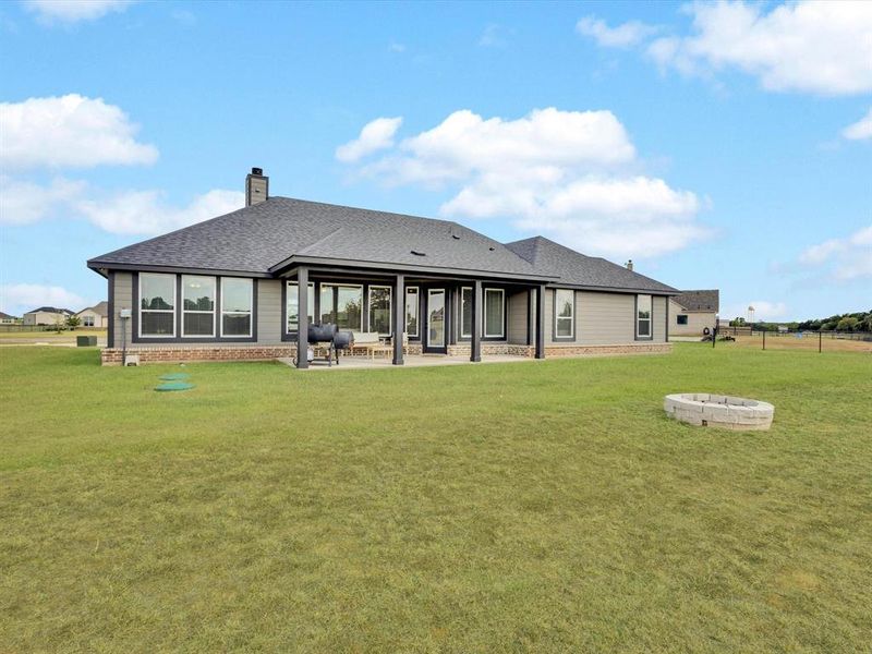 Front exterior of a new home in Regent Park, Springtown, TX, highlighting curb appeal (Image 19).