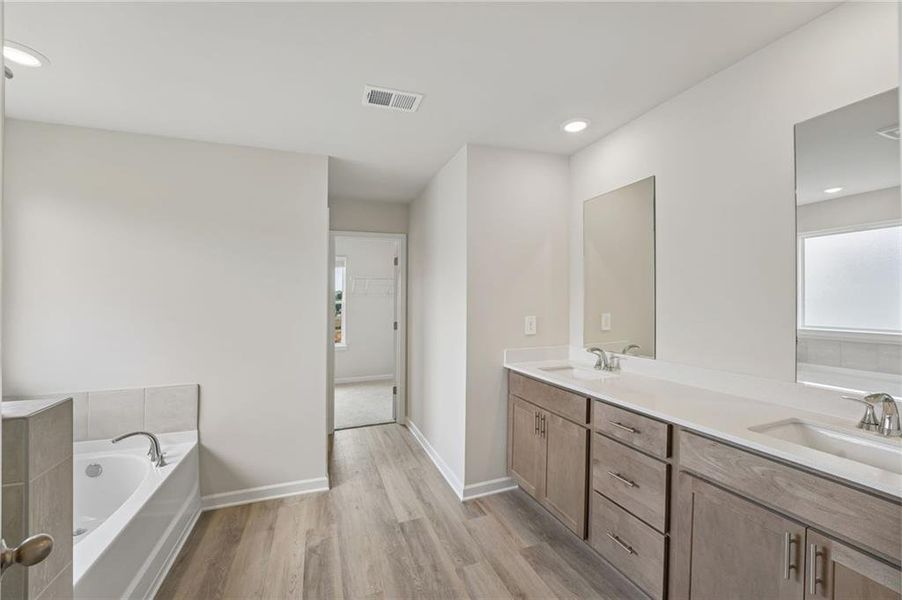 Furnished interior view inside a new home in Northwoods at Mirror Lake, Villa Rica (Image 12).