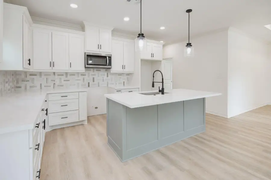 **Photos are of a previously built home with the same floorplan. Finishes are similar but not exact.