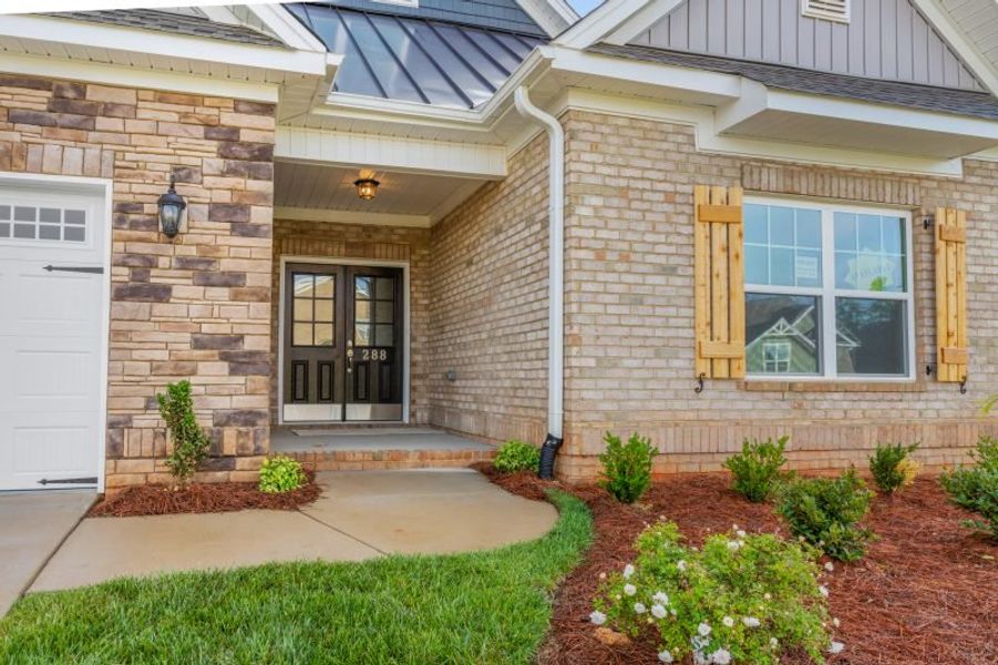 Representative exterior details of a home built from the Somerset by Keystone Homes NC in Weybridge, Burlington (Image 3). Representative exterior details of a home built from the Somerset by Keystone Homes NC in Weybridge, Burlington (Image 3).