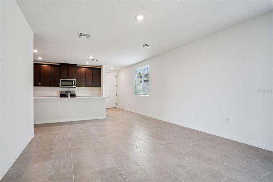 Spacious, unfurnished interior of a new home in Ridgehaven - Villas, Ormond Beach (Image 17).