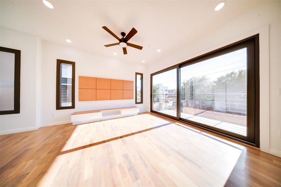 Spare room featuring light hardwood / wood-style flooring and ceiling fan