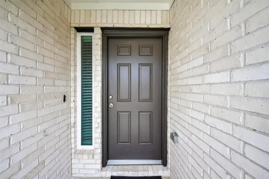 Exterior details and patio area of a home in Rollingbrook Estates, Baytown (Image 3). Exterior details and patio area of a home in Rollingbrook Estates, Baytown (Image 3).