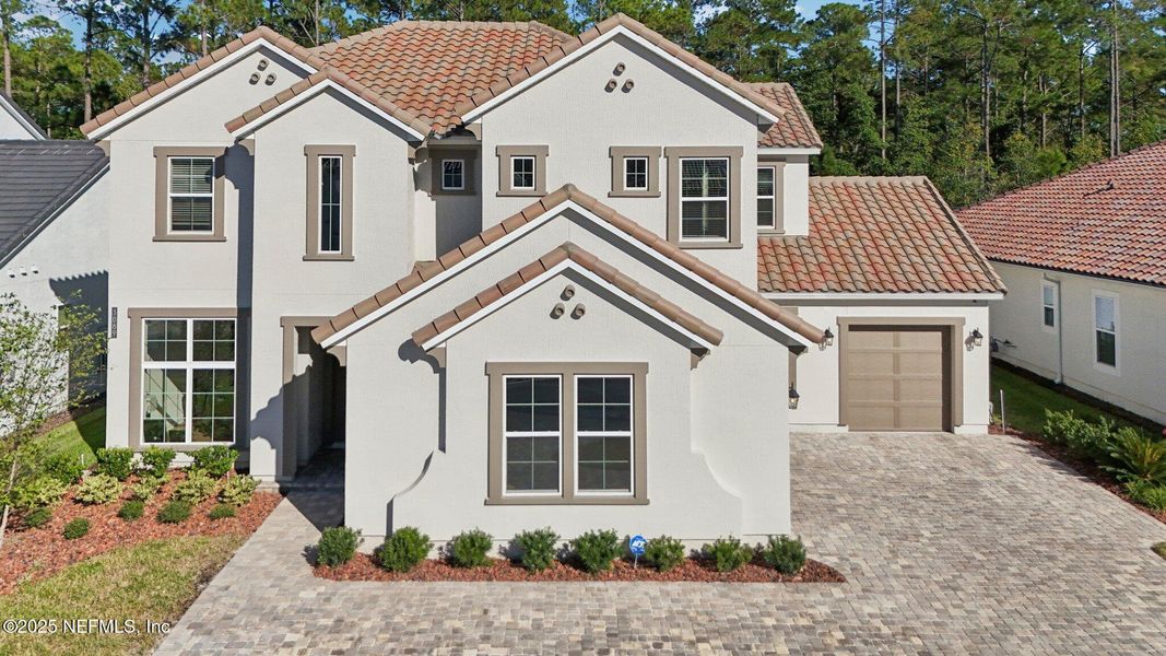 Front exterior of a new home in Tamaya, Jacksonville, FL, highlighting curb appeal (Image 29). Front exterior of a new home in Tamaya, Jacksonville, FL, highlighting curb appeal (Image 29).