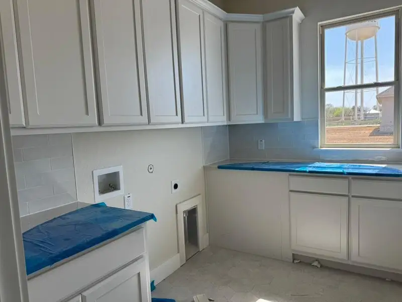 In-progress construction of a new home in Rocky Top, Krum, TX (Image 11).