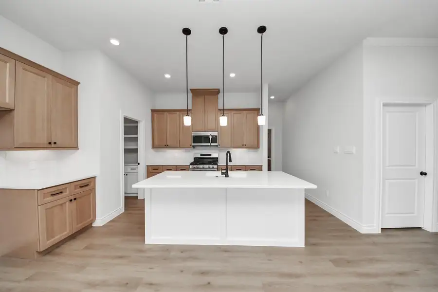 Furnished interior view inside a new home in Lexington Heights, Willis (Image 7).