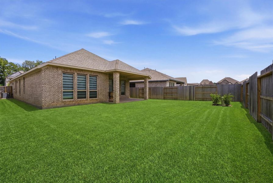 Exterior details and patio area of a home in , Humble (Image 20). Exterior details and patio area of a home in , Humble (Image 20).