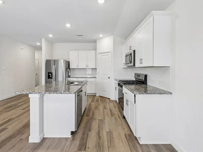 Furnished interior view inside a new home in Morgan Farms, Josephine (Image 7).