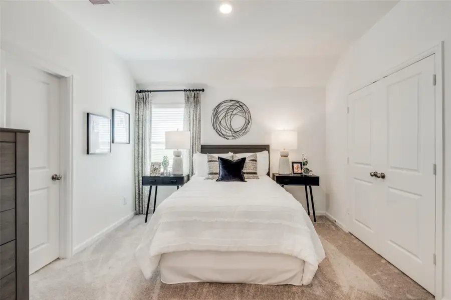 Furnished interior view inside a new home in Bridgeland, Cypress (Image 30).