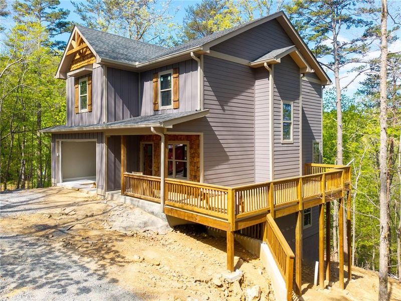 Exterior details and patio area of a home in , Ellijay (Image 13).