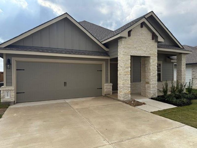 Front exterior of a new home in Southern Pointe, College Station, TX, highlighting curb appeal (Image 2).