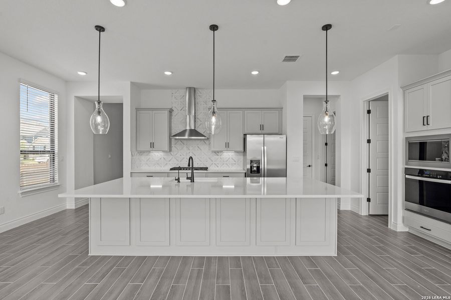 Furnished interior view inside a new home in Bison Ridge, San Antonio (Image 12).