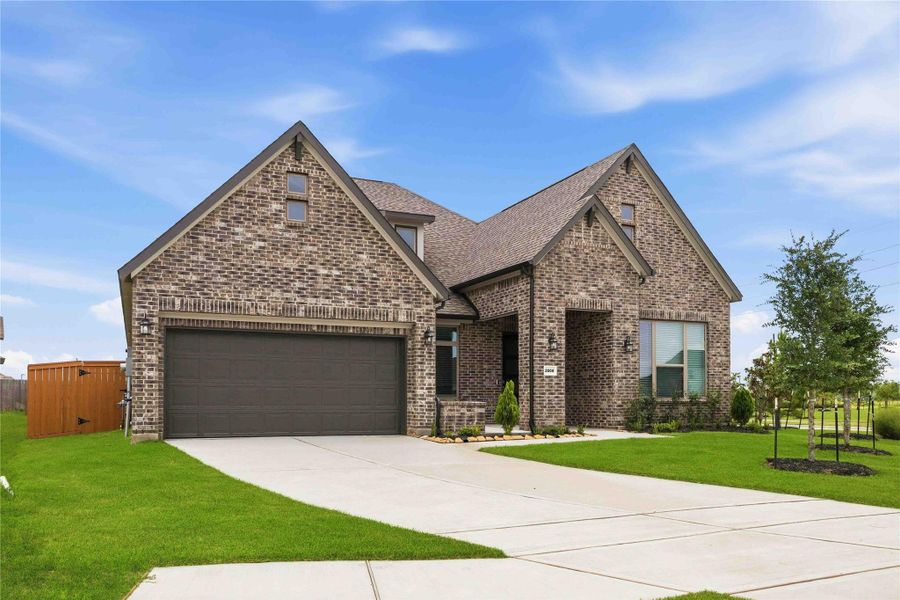 Front exterior of a new home in Canterra Creek 60', Rosharon, TX, highlighting curb appeal (Image 1). Front exterior of a new home in Canterra Creek 60', Rosharon, TX, highlighting curb appeal (Image 1).