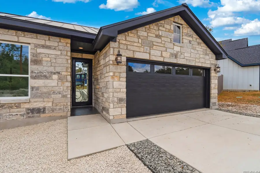Exterior details and patio area of a home in , Spring Branch (Image 23).