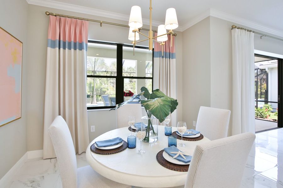 Furnished interior view inside a new home in Boca Royale Golf & Country Club at Wellen Park, Englewood (Image 11).