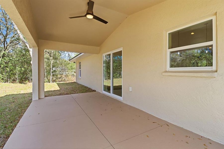 Exterior details and patio area of a home in , Citrus Springs (Image 3).