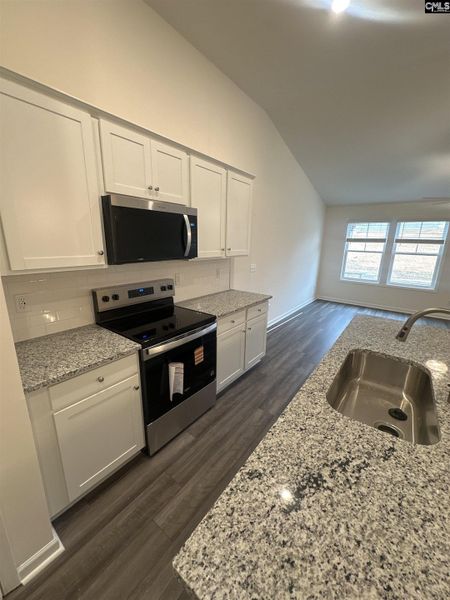 Furnished interior view inside a new home in Piney Woods Bluff, Columbia (Image 5). Furnished interior view inside a new home in Piney Woods Bluff, Columbia (Image 5).