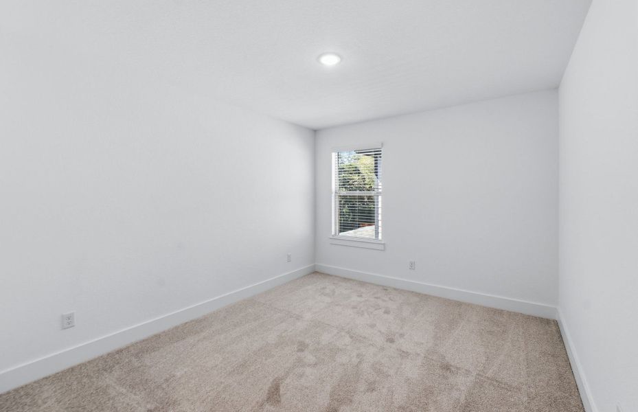 Spacious, unfurnished interior of a new home in Saddleback at Santa Rita Ranch, Liberty Hill (Image 39).