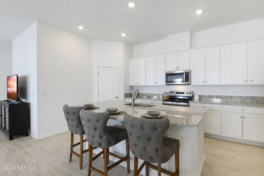 Furnished interior view inside a new home in , Orange Park (Image 12).