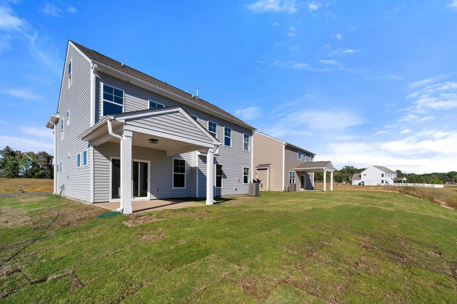 Exterior details and patio area of a home in Monterra, Kernersville (Image 24).