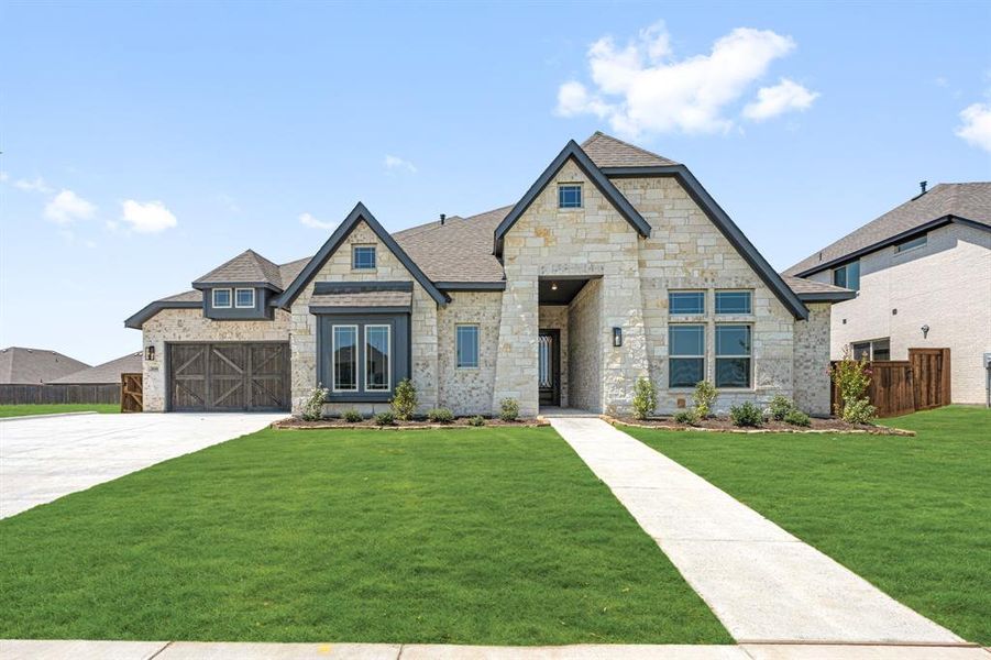 Front exterior of a new home in Somerset Classic 70s & 80s, Mansfield, TX, highlighting curb appeal (Image 1). Front exterior of a new home in Somerset Classic 70s & 80s, Mansfield, TX, highlighting curb appeal (Image 1).