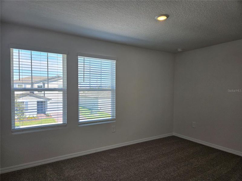 Spacious, unfurnished interior of a new home in Lawson Dunes - Signature Series, Haines City (Image 30).