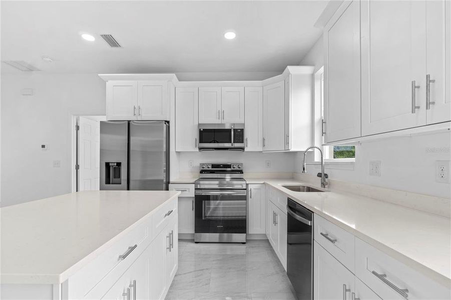Furnished interior view inside a new home in , Dunnellon (Image 10).
