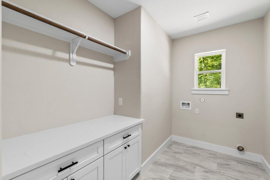 Spacious laundry room.