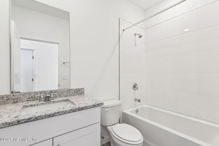 Furnished interior view inside a new home in Lakes at Bella Lago - Signature Series, Green Cove Springs (Image 5). Furnished interior view inside a new home in Lakes at Bella Lago - Signature Series, Green Cove Springs (Image 5).