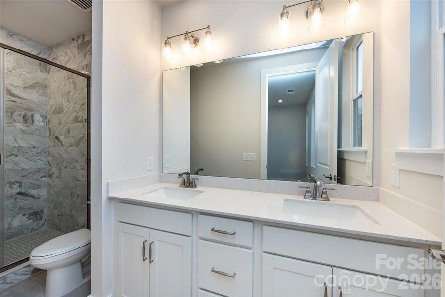 Dual vanity primary bathroom