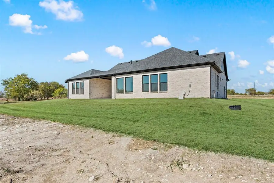 Exterior details and patio area of a home in Rolling Creek Ranch, Aledo (Image 3).