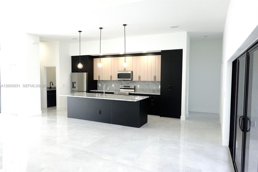 Furnished interior view inside a new home in , Port Charlotte (Image 9).