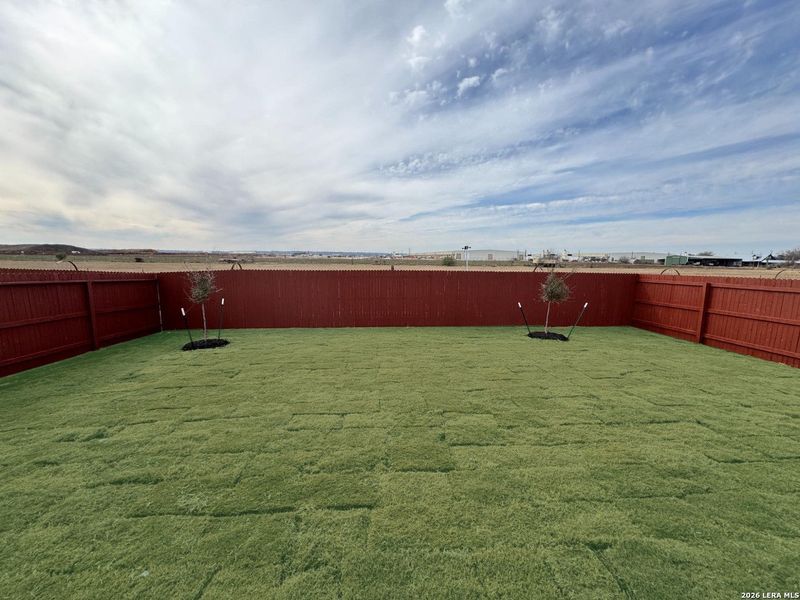 Exterior details and patio area of a home in Megan's Landing, Castroville (Image 3).
