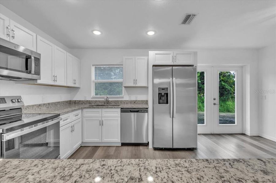 Furnished interior view inside a new home in , Punta Gorda (Image 6).