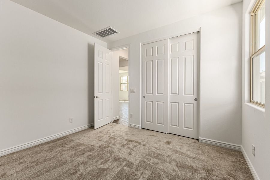 Spacious, unfurnished interior of a new home in Miravida, Surprise (Image 19). Spacious, unfurnished interior of a new home in Miravida, Surprise (Image 19).