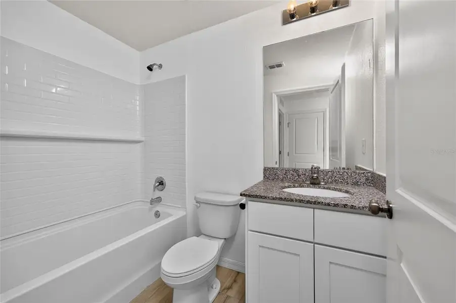 Furnished interior view inside a new home in , Port Charlotte (Image 17).