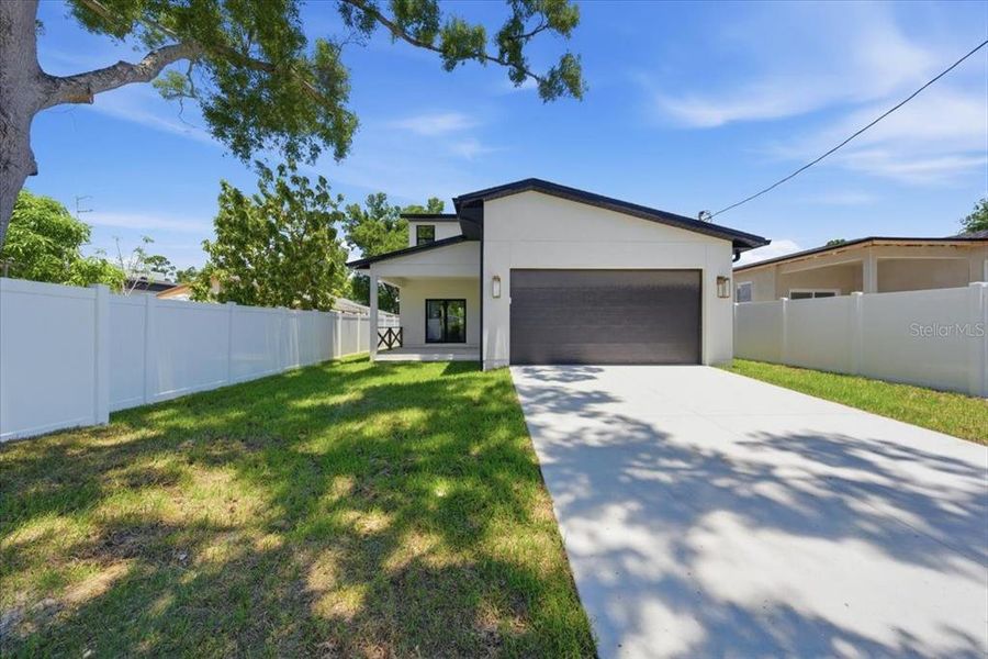 Front exterior of a new home in , St. Petersburg, FL, highlighting curb appeal (Image 27). Front exterior of a new home in , St. Petersburg, FL, highlighting curb appeal (Image 27).