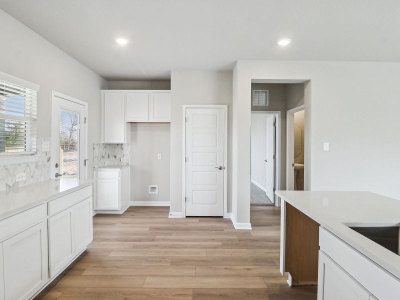 Kitchen in the Medina floorplan at a Meritage Homes community. Kitchen in the Medina floorplan at a Meritage Homes community.