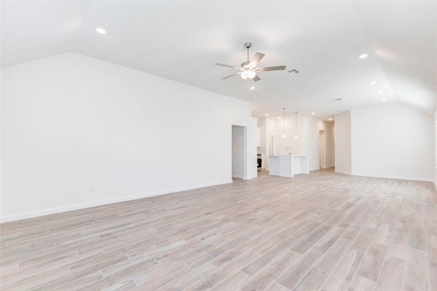 From every angle, this open-plan layout shines. Spacious enough for hosting large gatherings, yet cozy for everyday living. Clean architectural lines, soft recessed lighting, and light-toned flooring create a bright, airy feel that flows effortlessly from room to room. From every angle, this open-plan layout shines. Spacious enough for hosting large gatherings, yet cozy for everyday living. Clean architectural lines, soft recessed lighting, and light-toned flooring create a bright, airy feel that flows effortlessly from room to room.