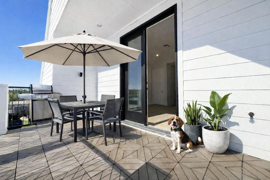 Private rooftop terrace off the third-floor game room! Virtual staging added.