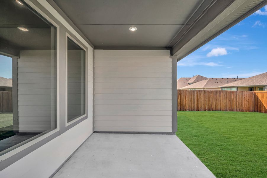 Exterior details and patio area of a home in The Meadows, Denton (Image 3).