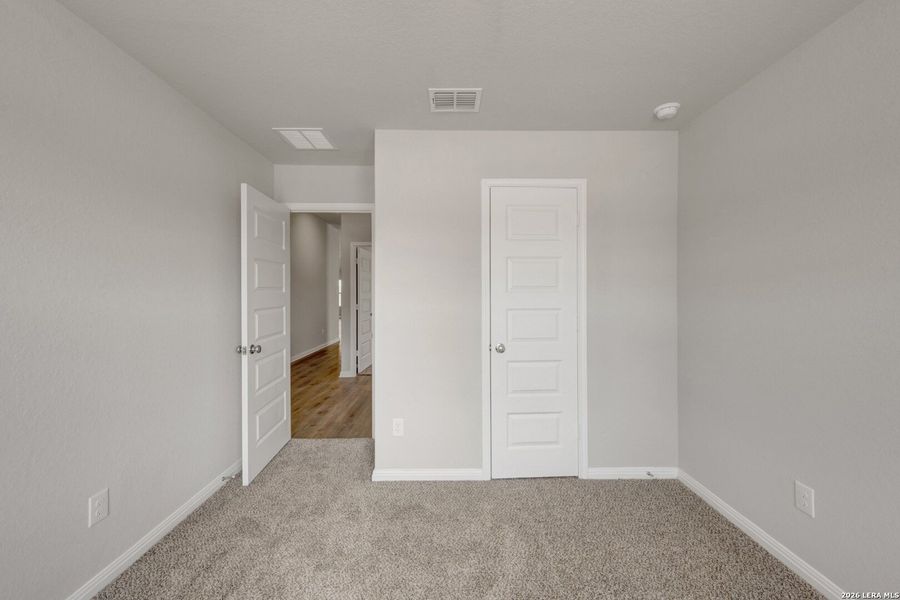Spacious, unfurnished interior of a new home in Verano Farms, San Antonio (Image 27).
