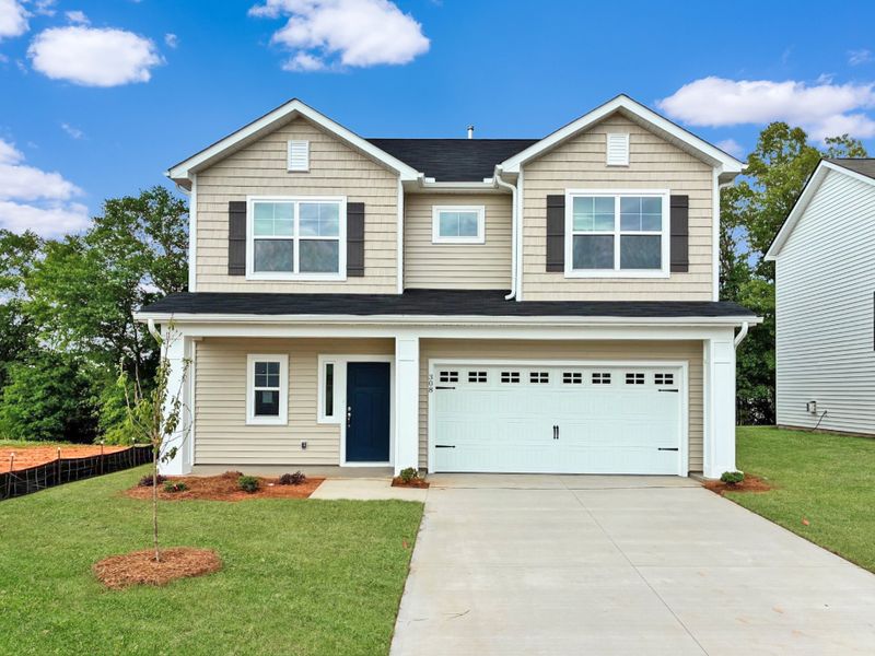 Front exterior of a new home in Holly Ridge, Greenville, SC, highlighting curb appeal (Image 1). Front exterior of a new home in Holly Ridge, Greenville, SC, highlighting curb appeal (Image 1).