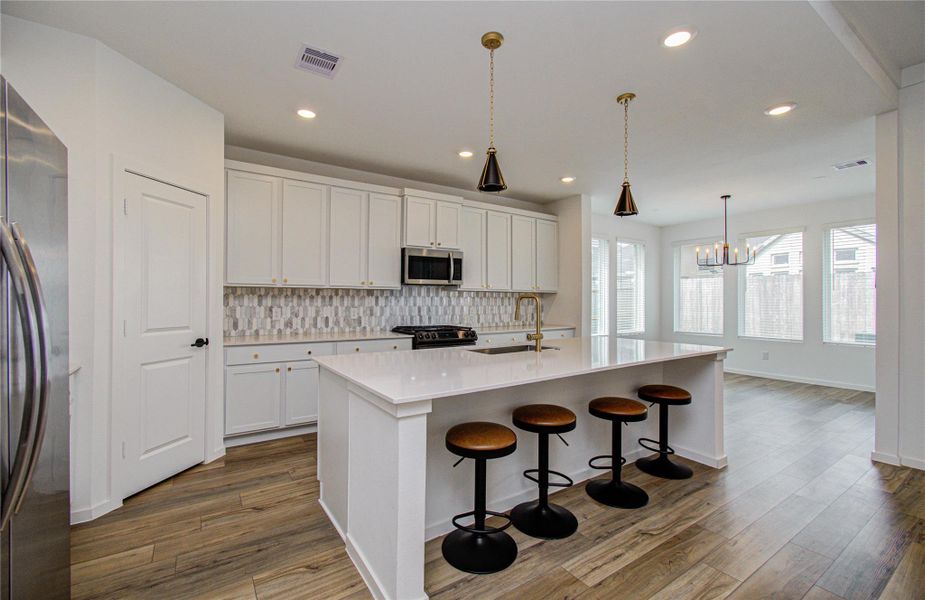 Furnished interior view inside a new home in Harvest Green, Richmond (Image 4).
