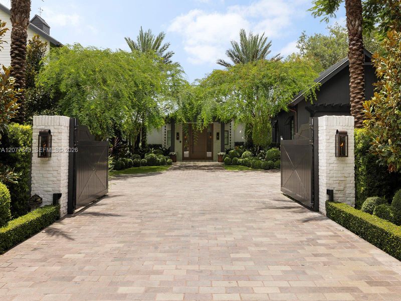 Front exterior of a new home in , Miami, FL, highlighting curb appeal (Image 1). Front exterior of a new home in , Miami, FL, highlighting curb appeal (Image 1).
