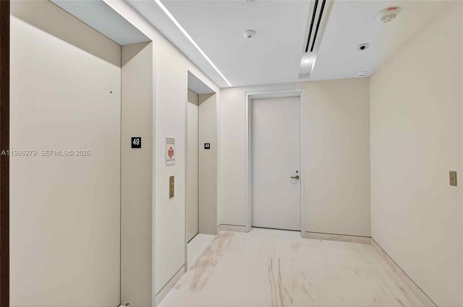 Spacious, unfurnished interior of a new home in Aston Martin Residences, Miami (Image 25). Spacious, unfurnished interior of a new home in Aston Martin Residences, Miami (Image 25).